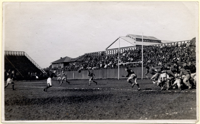 Berkeley High School Rugby Team, October 28, 1911. Norman Slater trying to block a kick from the full back of Oakland.